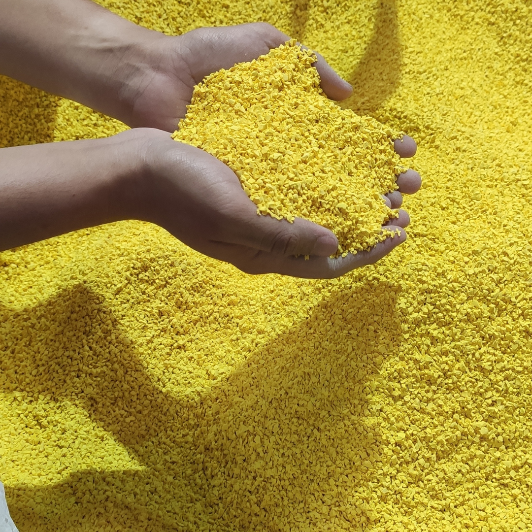 Yellow EPDM granules from a trusted EPDM granules supplier for playground and flooring applications.